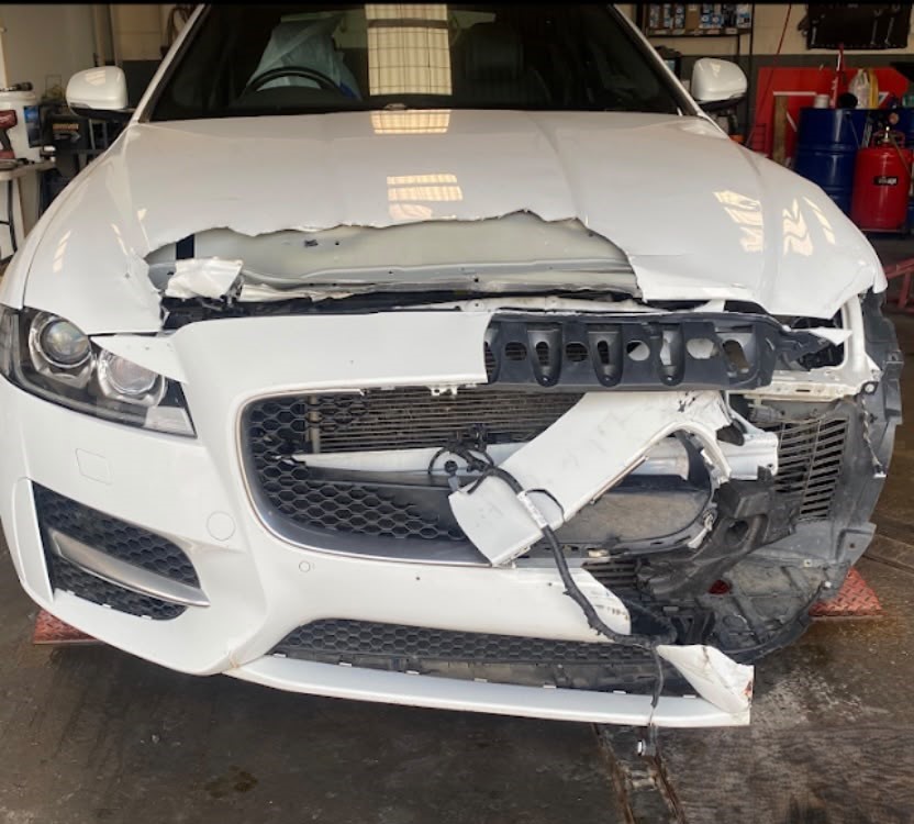 Jaguar XF front end damage before repair