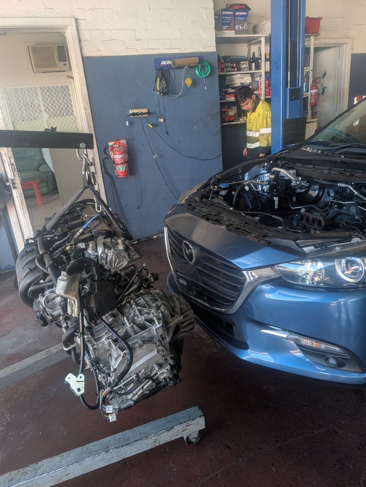 Mechanical work — engine and transmission removal in our workshop