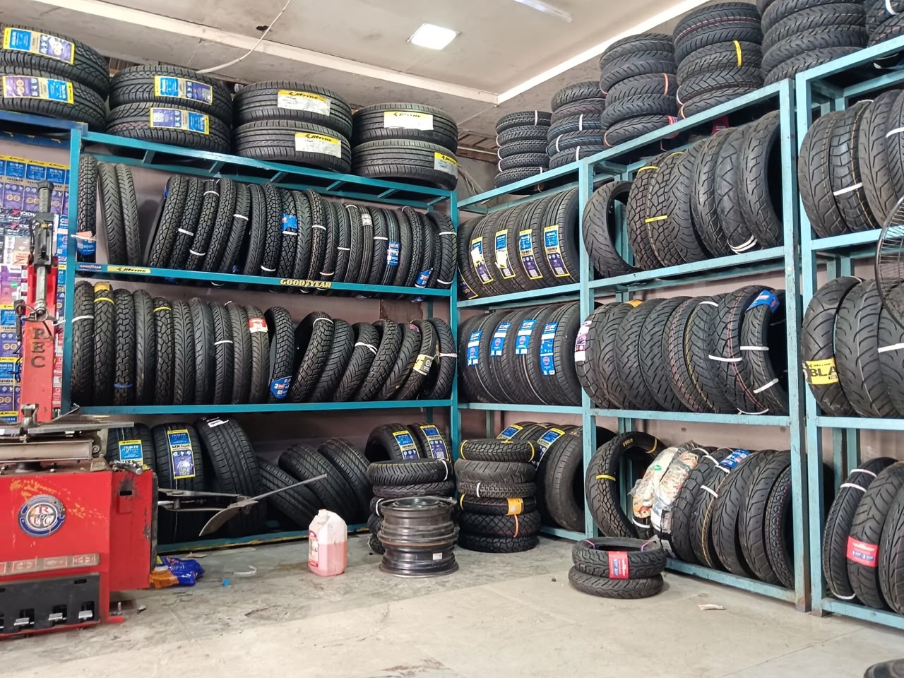 Wall of new car and motorcycle tyres in stock at Prospect Road Auto Repair