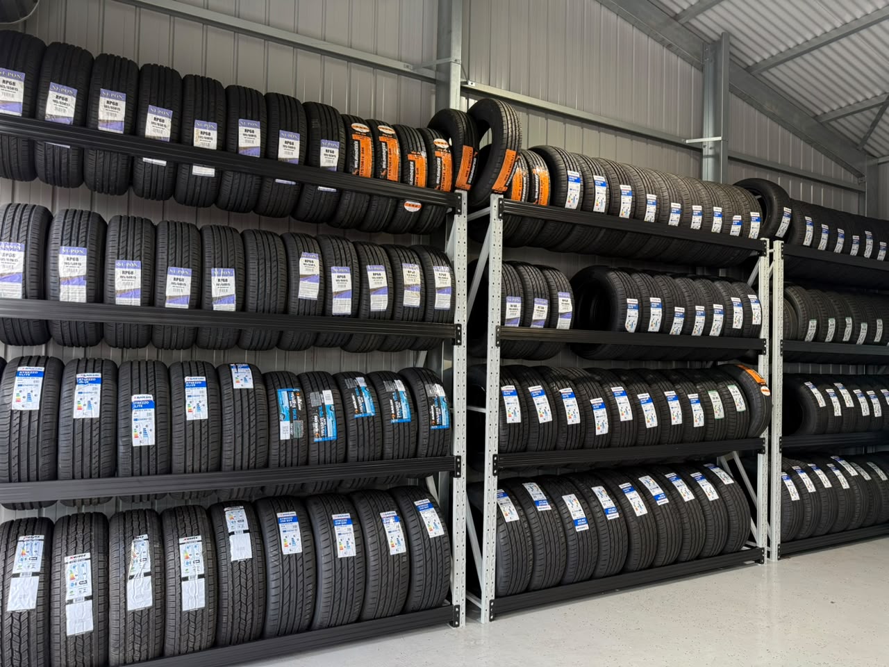 Full wall of tyres at Prospect Road Auto Repair